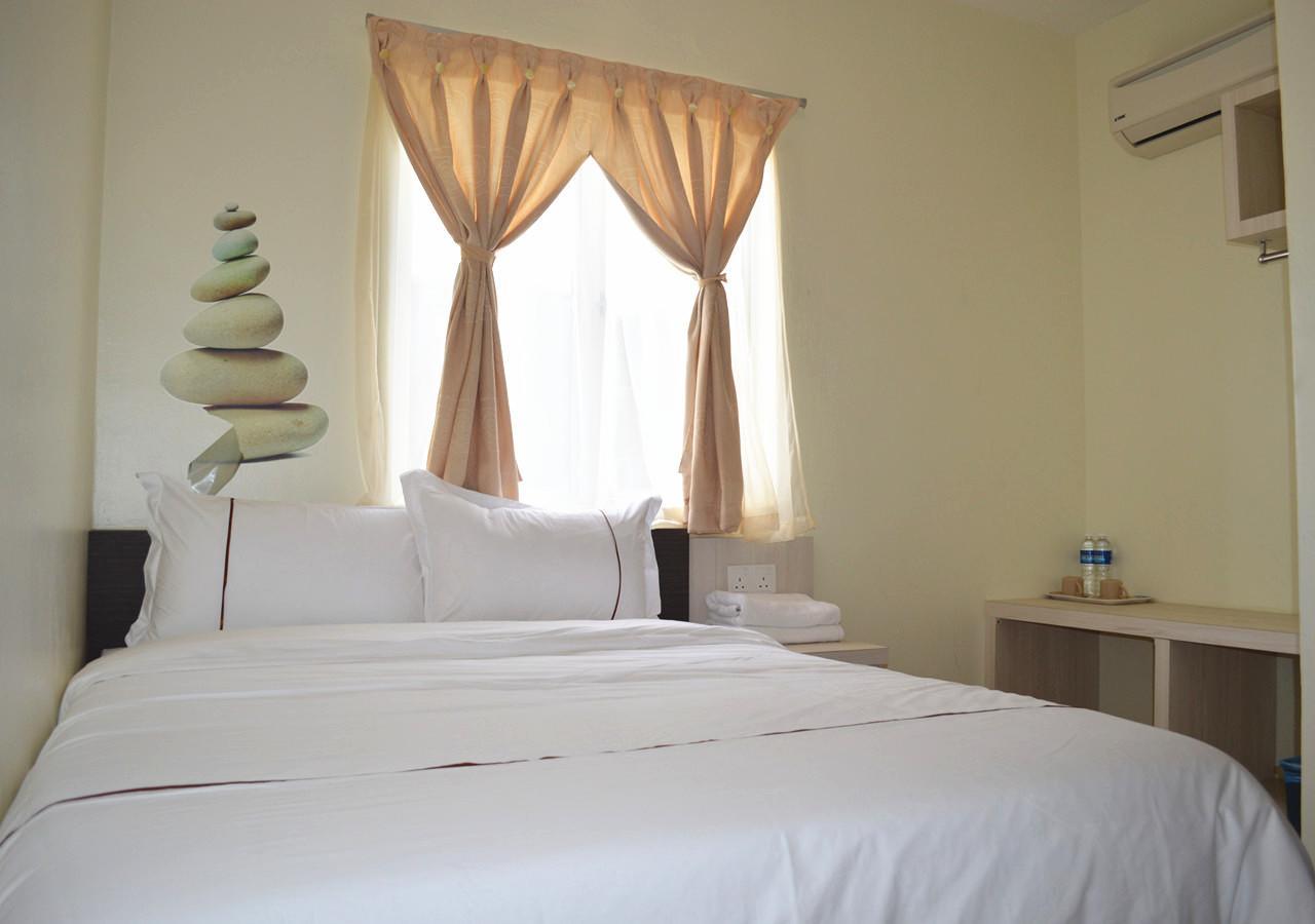 Angsoka Hotel Teluk Intan Kültér fotó