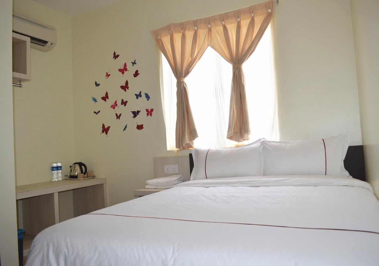 Angsoka Hotel Teluk Intan Kültér fotó